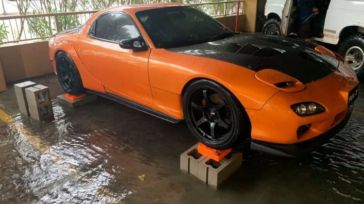 Man saves total stranger’s Mazda RX-7 from getting swept away in a flood