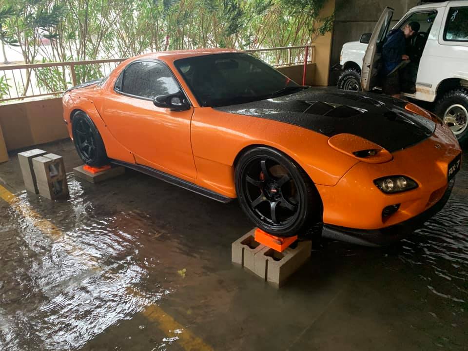 Man saves total stranger’s Mazda RX-7 from getting swept away in a flood 02