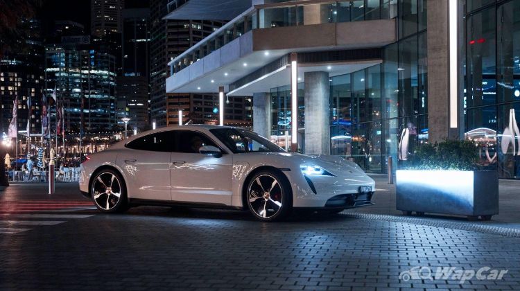 Porsche Taycan mixes water with electricity at Sydney's Darling Harbor